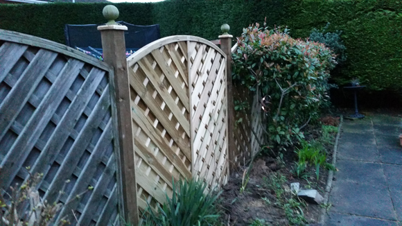 New arched panel and post installed.